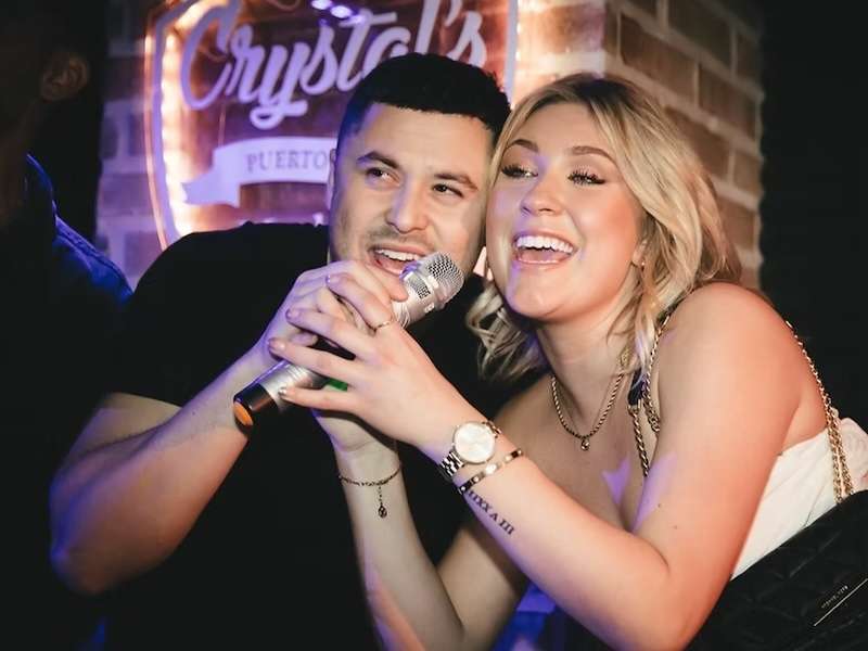 Crystal's Karaoke Marbella, Puerto Banus, couple singing to high quality music, great vibe